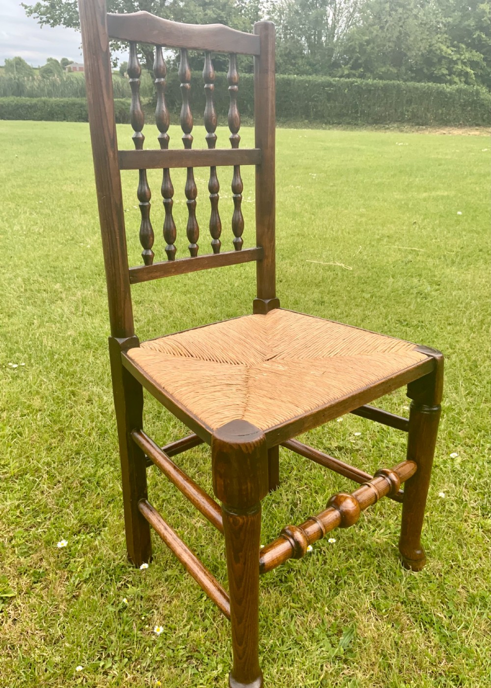 Eight early 19th century elm dining chairs View XVIII