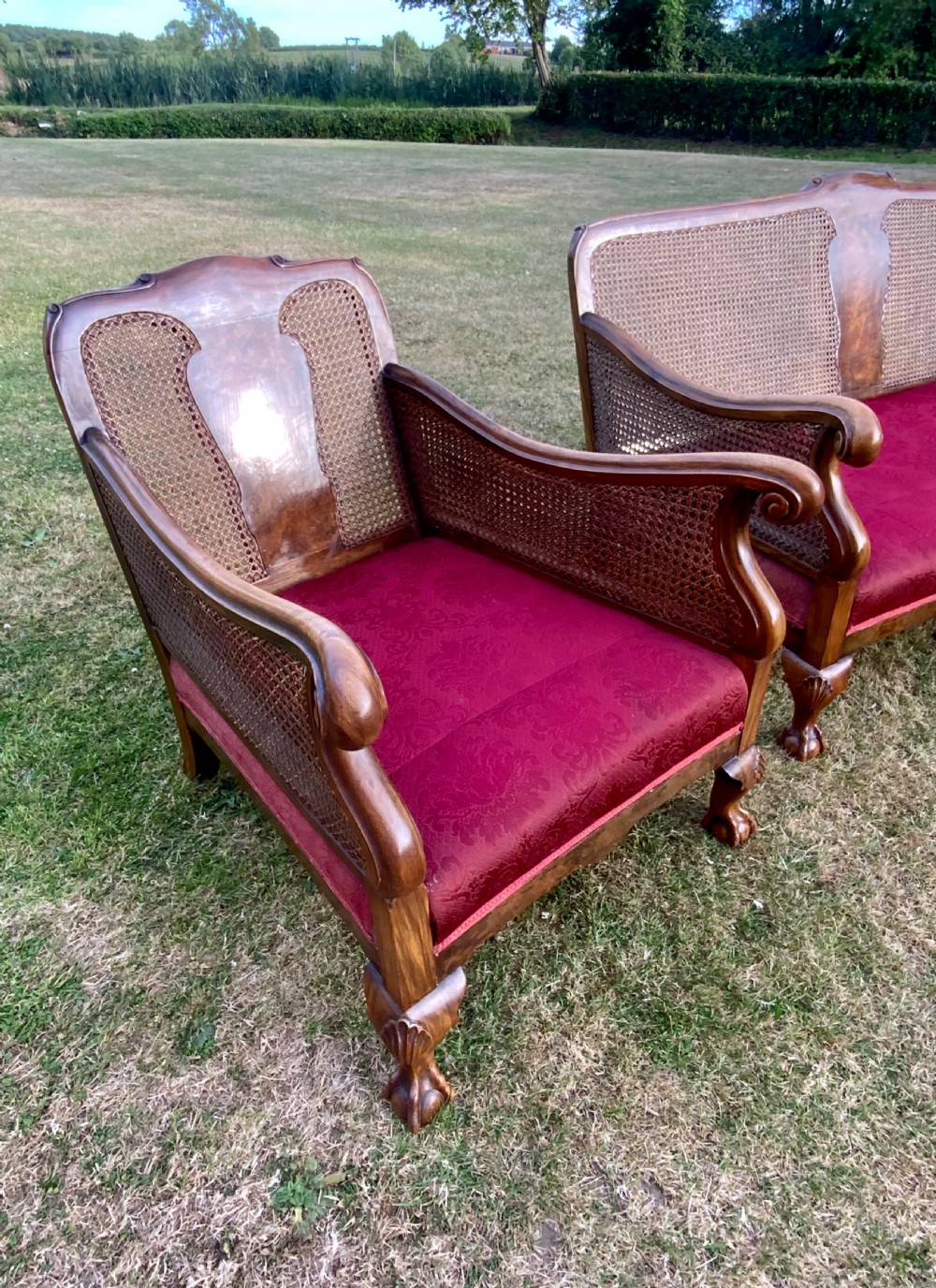 An walnut  bergére settee and pair or arm chairs View VIII