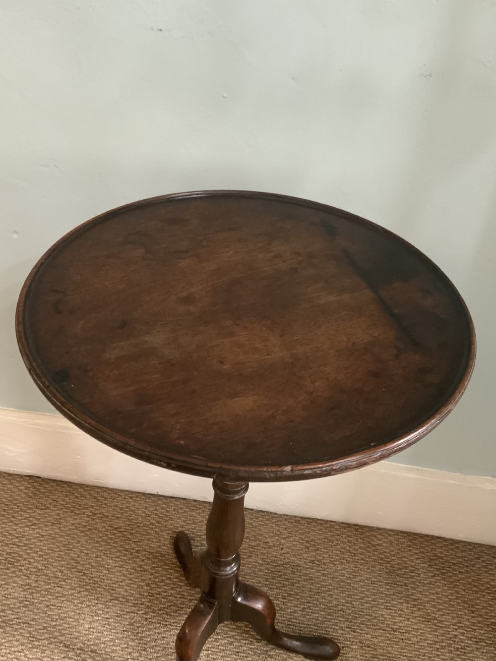 An 18th century mahogany tripod table View II