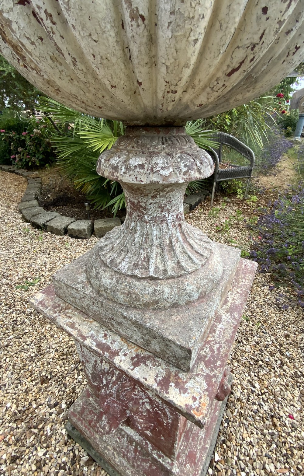 A large terracotta garden urn on plinth View V