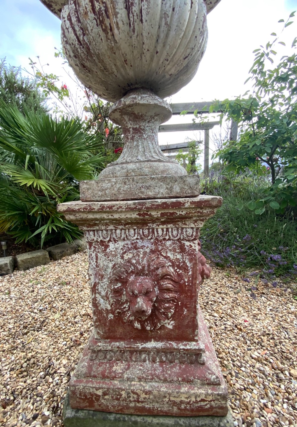 A large terracotta garden urn on plinth View VII