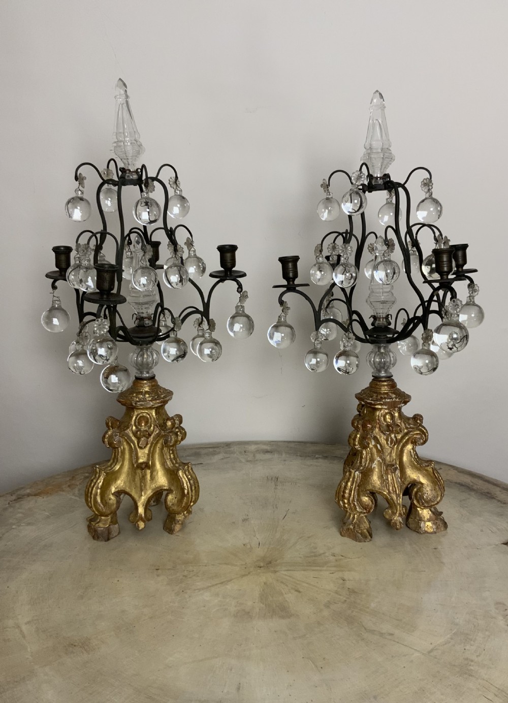 Pair of carved gilt-wood based candelabra