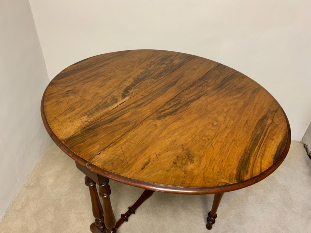 A Victorian walnut Sutherland table View III