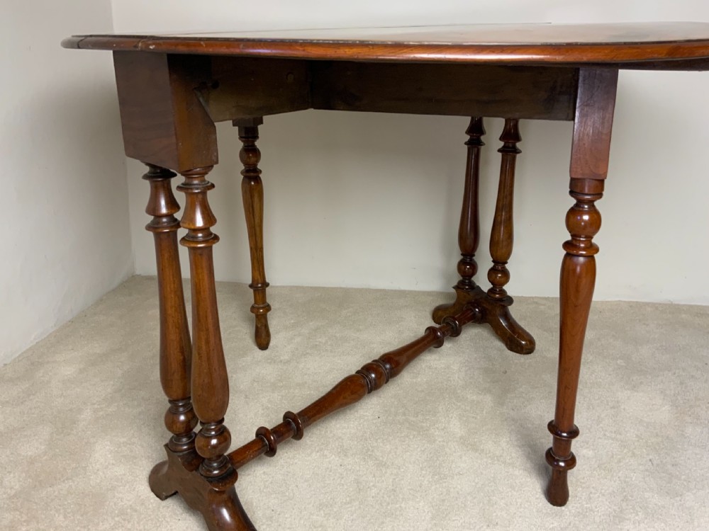A Victorian walnut Sutherland table View IV