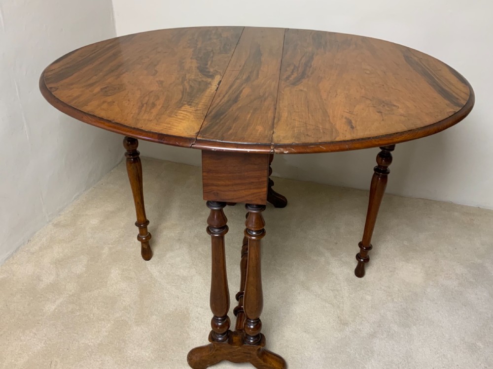 A Victorian walnut Sutherland table View VI