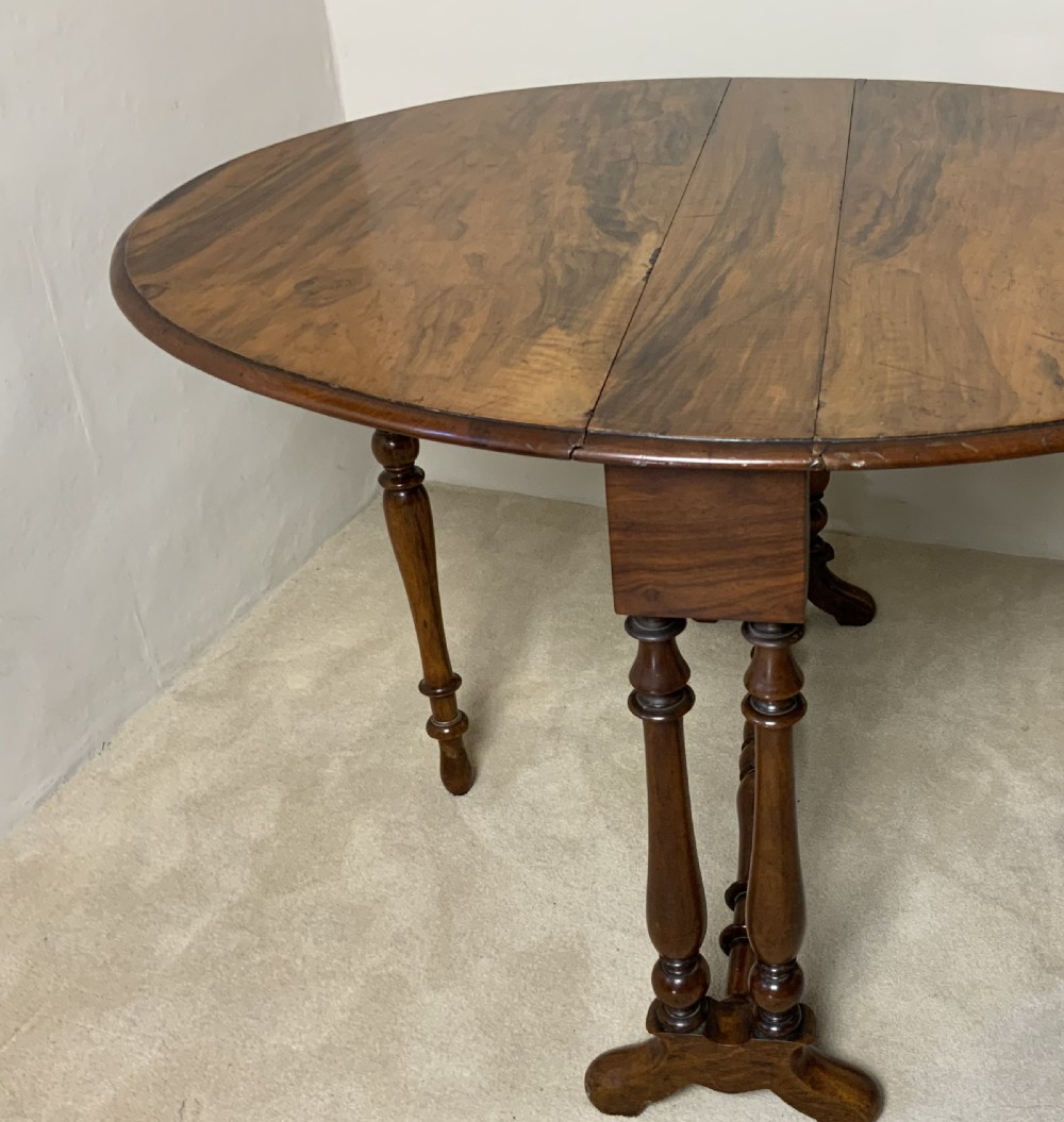 A Victorian walnut Sutherland table View VIII