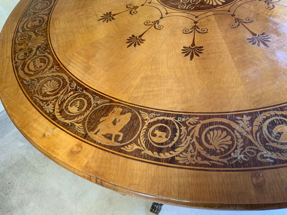 A continental marquetry centre  or drum table View II