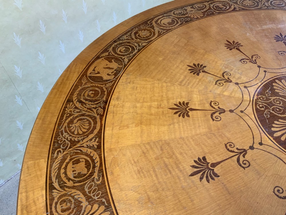 A continental marquetry centre  or drum table View III