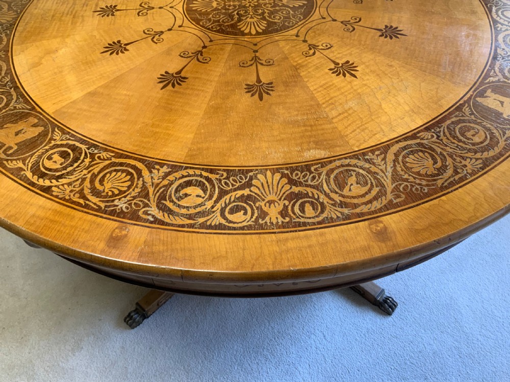 A continental marquetry centre  or drum table View IV