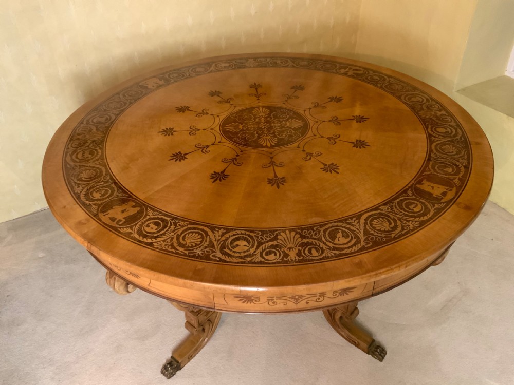 A continental marquetry centre  or drum table View VIII
