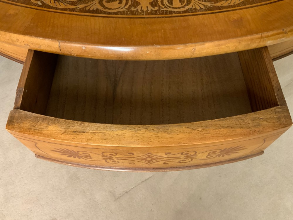 A continental marquetry centre  or drum table View IX