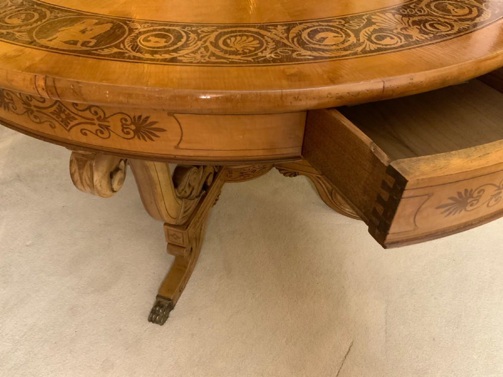 A continental marquetry centre  or drum table View X