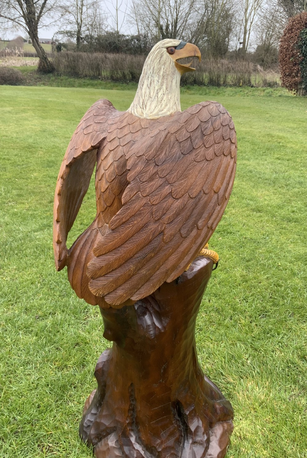 A large carved wood sculpture of an North American bald eagle View IV