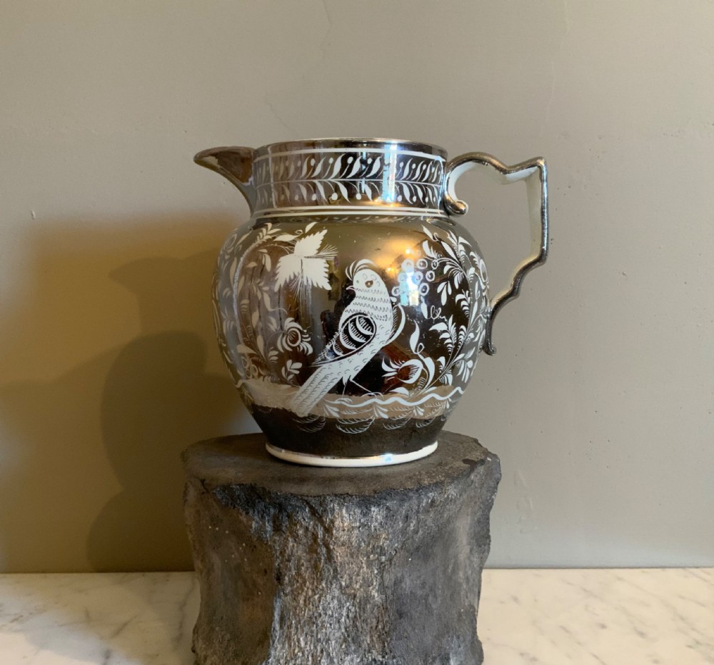 An early 19th century silver resist pottery jug View V