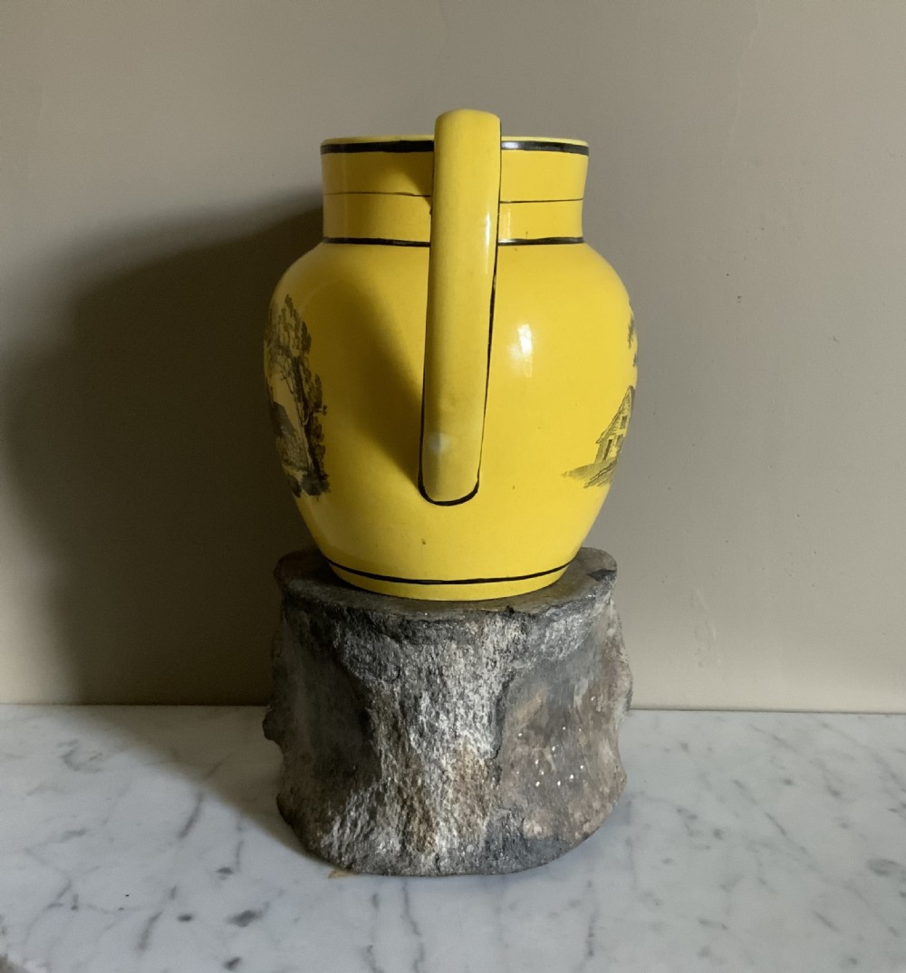 An early 19th century canary yellow pottery jug View V