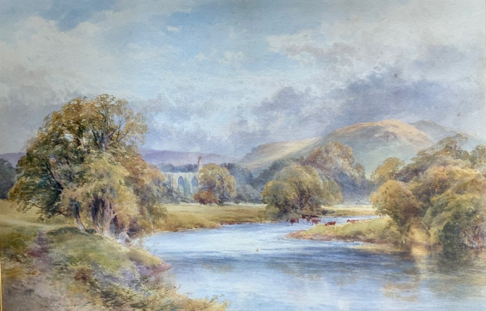 A framed 19th-century watercolour painting depicting a river running through a green landscape with trees and distant hills, set within an ornate gold gilt frame. View III