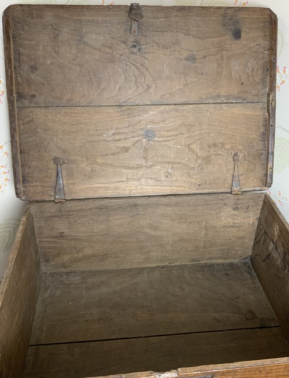 A rectangular warm brown elm bible box with carved initials S and P, dated 1737, featuring a central iron lock plate. View VIII