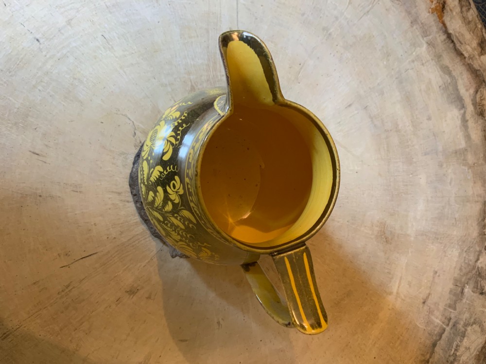 An early 19th century canary yellow jug the silver resist View V