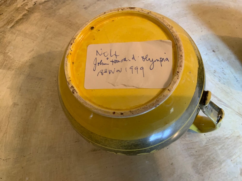 An early 19th century canary yellow jug the silver resist View VI