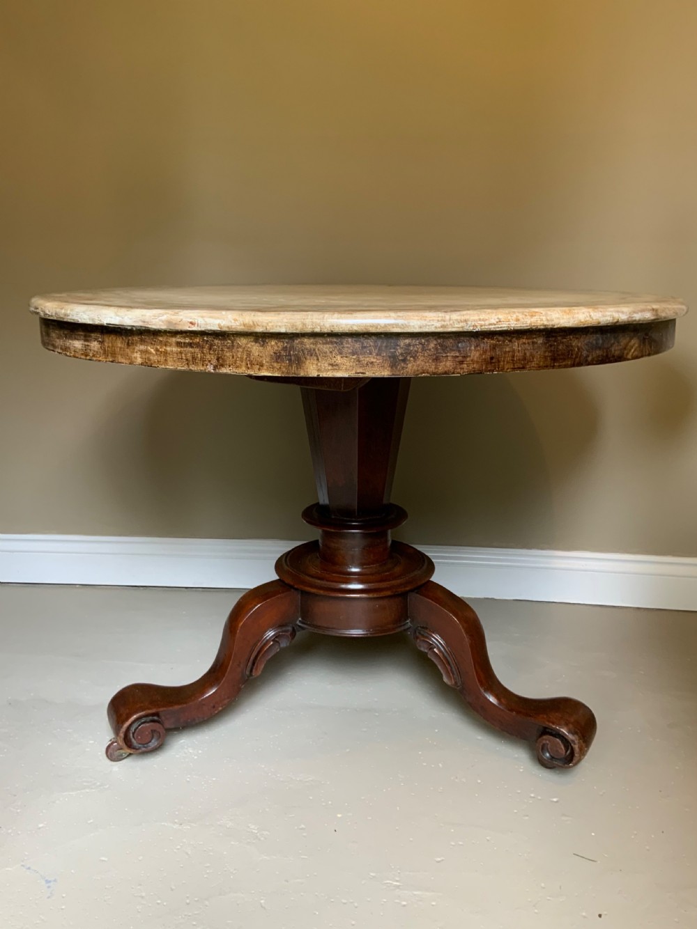 A mahogany based centre table with paint effect top View II