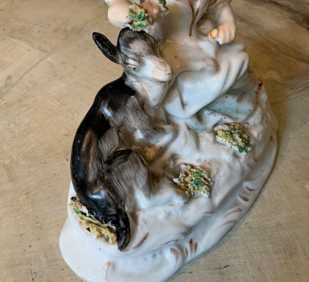 An English pottery figurative group View IV