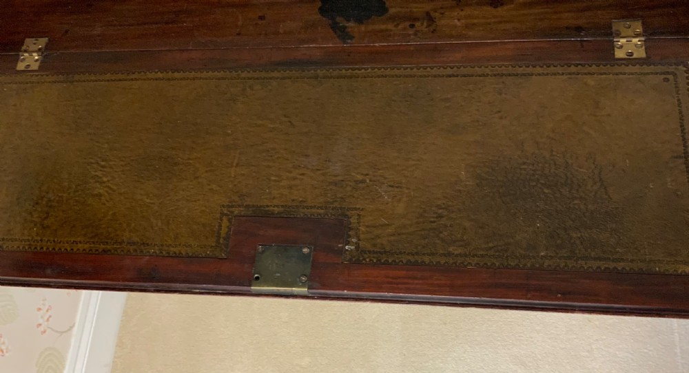 A George III mahogany bureau featuring a sloping front flap over four graduated drawers with brass swan-neck handles and bracket feet. View X