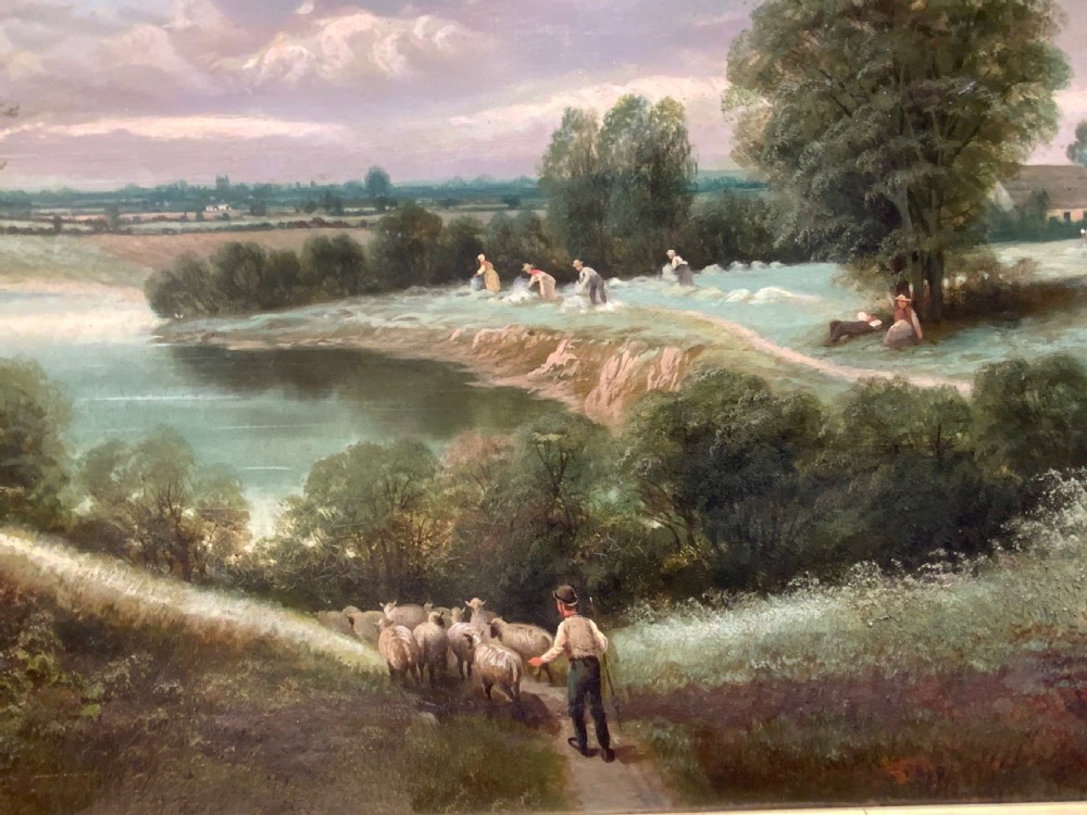 An antique 19th-century pastoral oil painting on canvas showing a shepherd driving sheep along a riverbank, set within an ornate gilded frame. View II