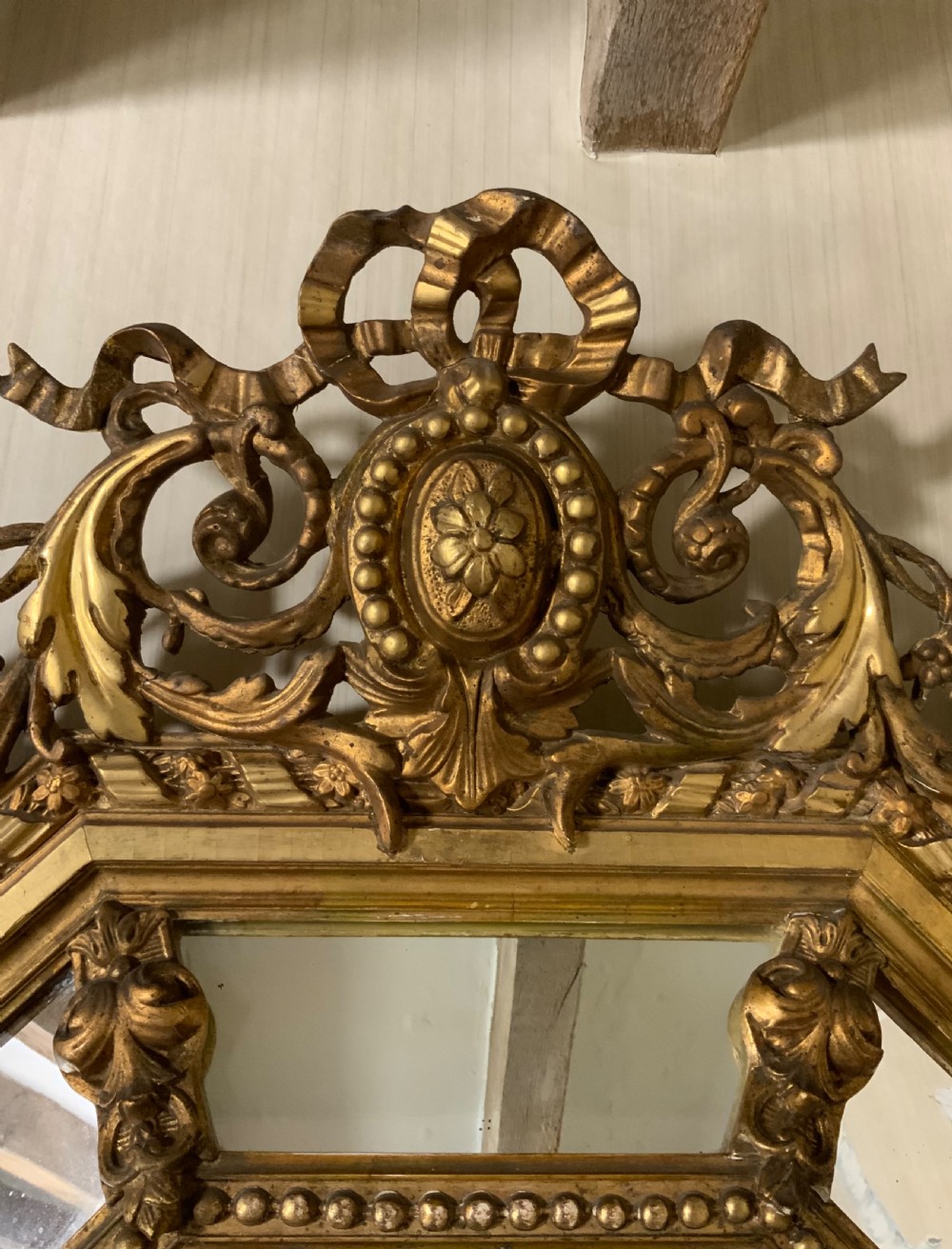 A mid Victorian gilt framed cushion mirror View III