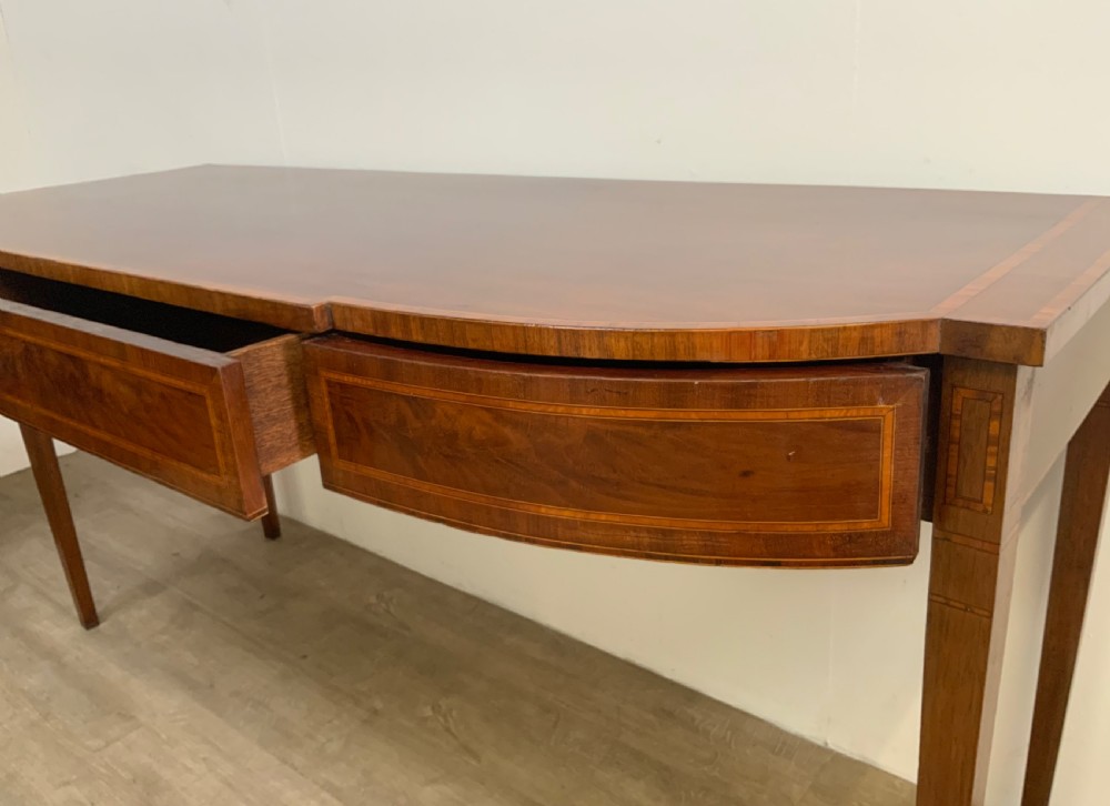 George III mahogany bow front serving table View III