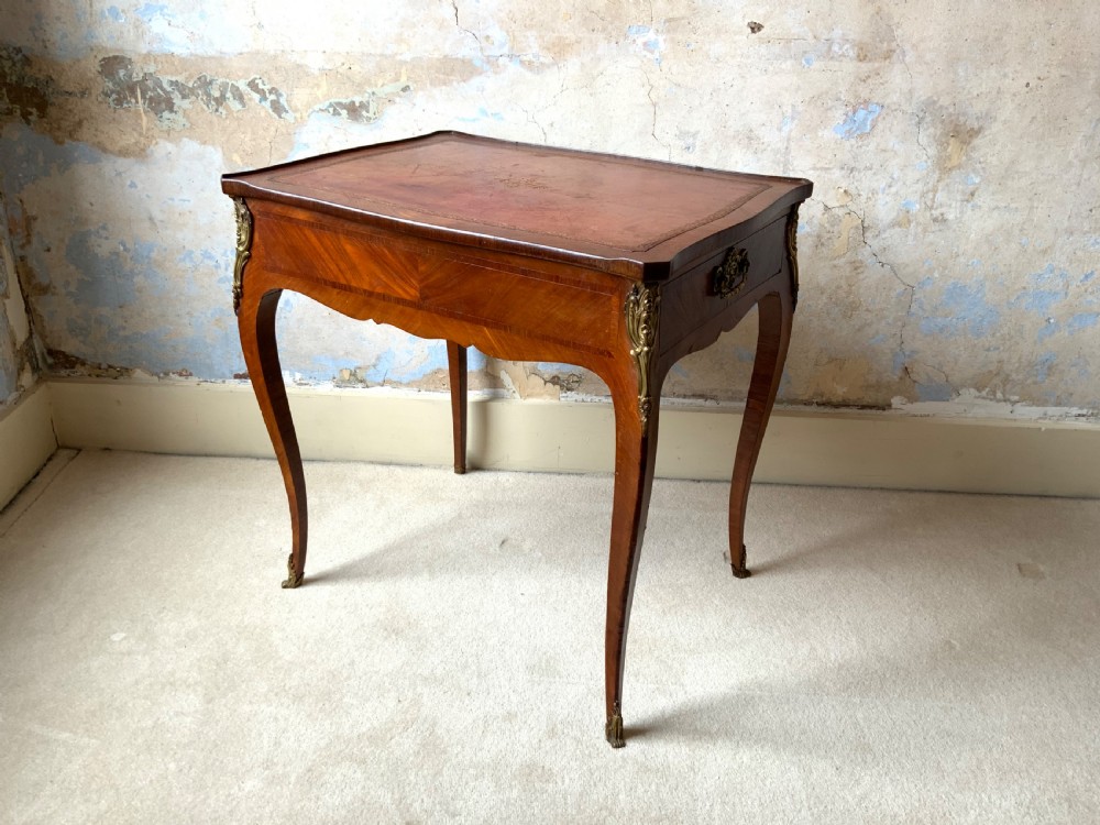 A 19th century leather topped writing table