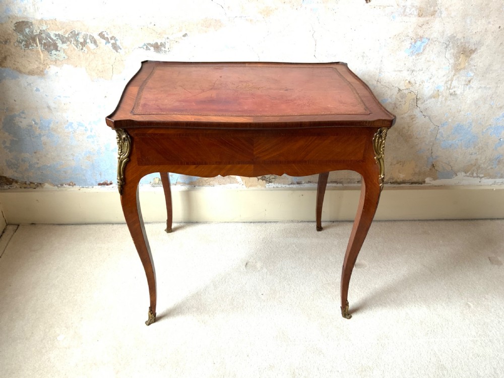 A 19th century leather topped writing table View III