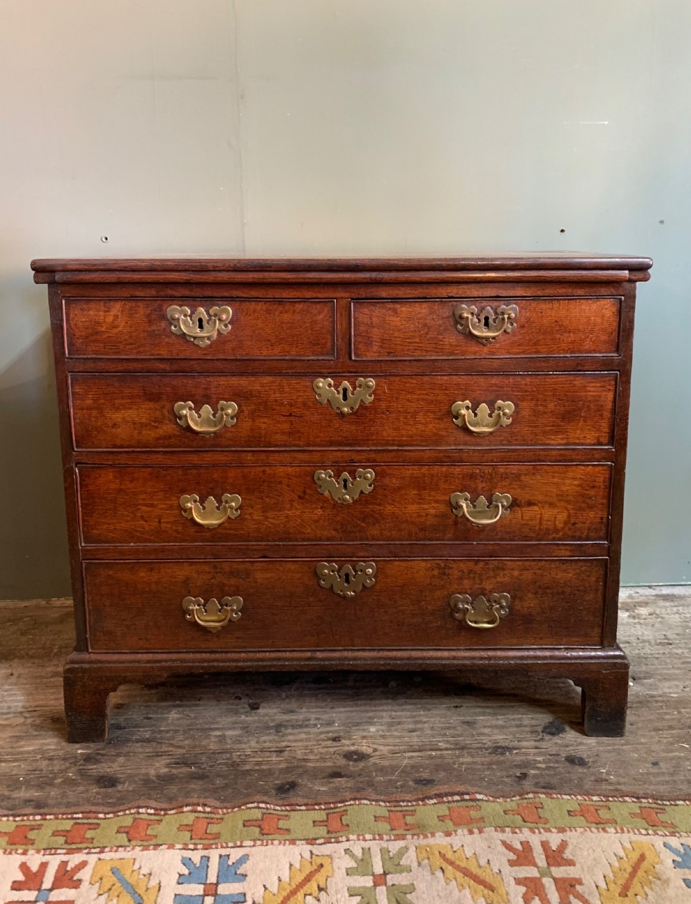 Georgian oak chest drawers with brushing slide