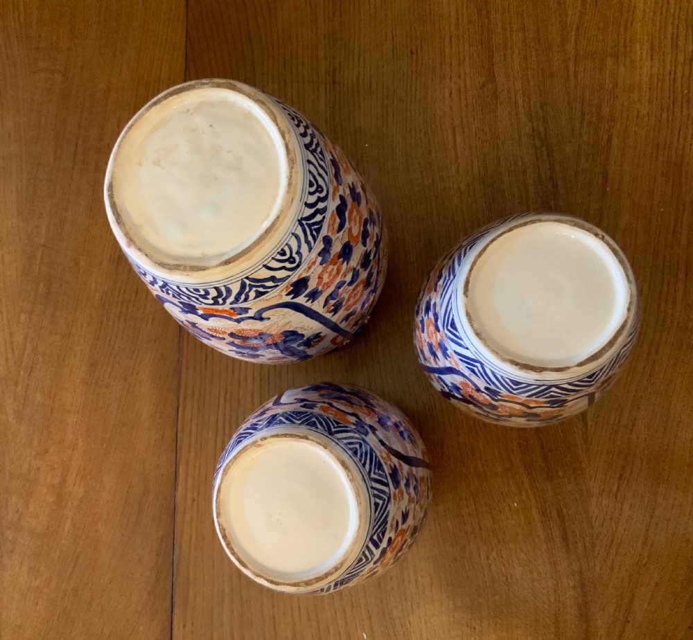 A garniture of 3 large Japanese Imari vases View VIII
