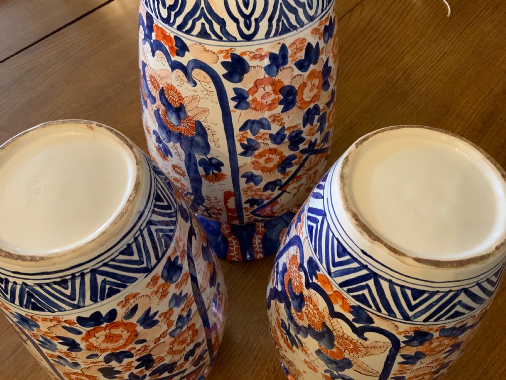 A garniture of 3 large Japanese Imari vases View IX