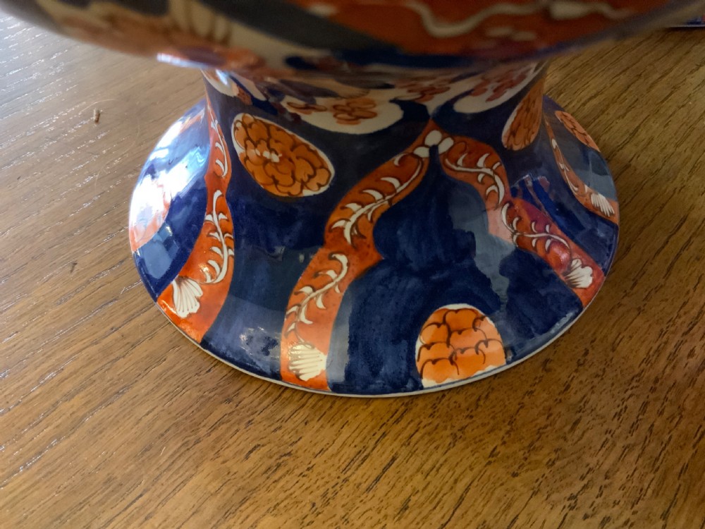 A garniture of 3 large Japanese Imari vases View X