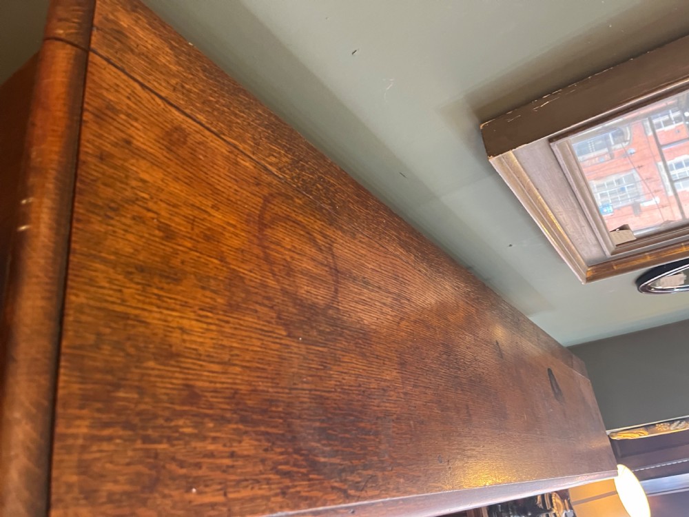 An Edwardian oak floor standing bookcase View IV