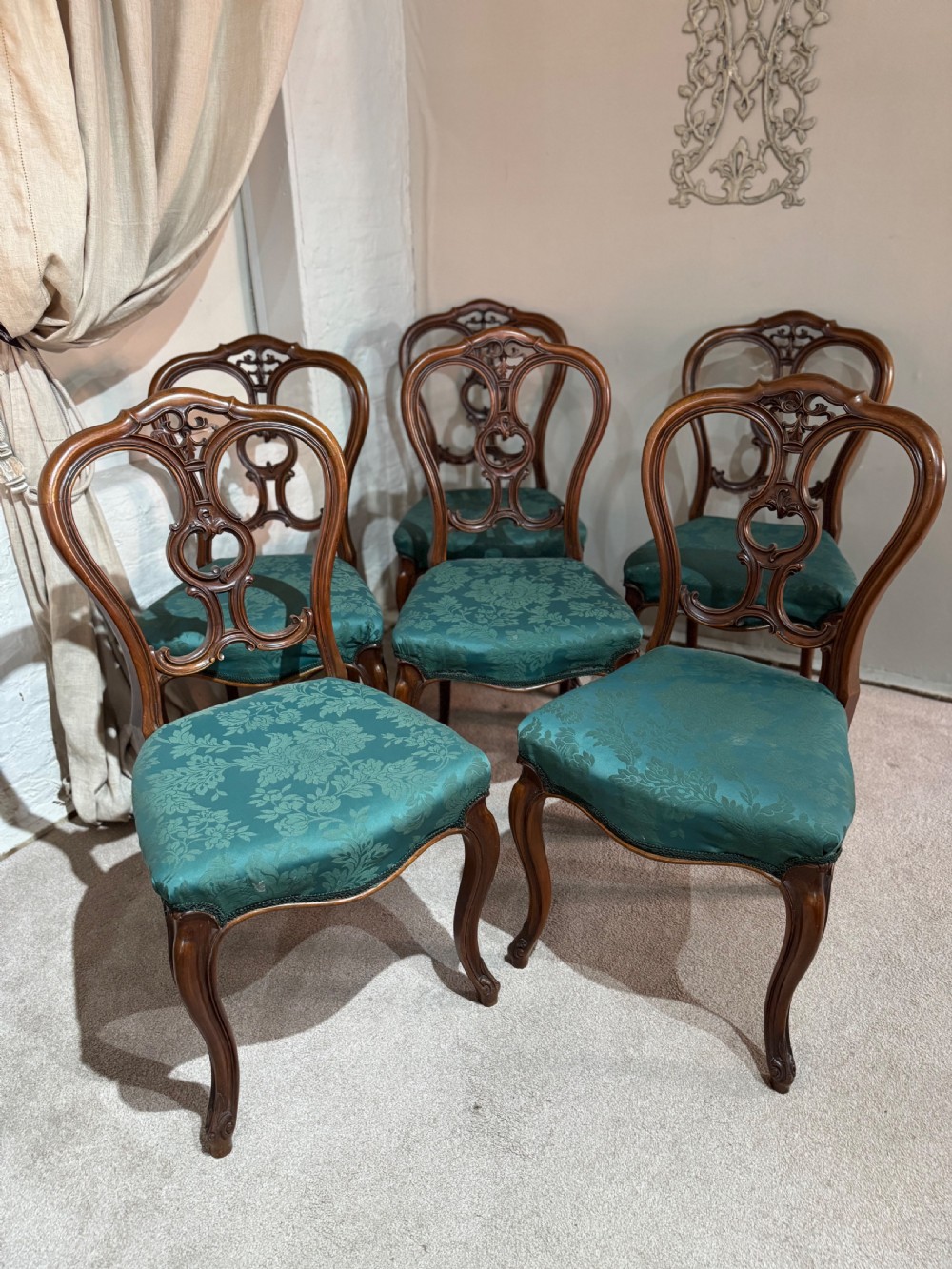A set six Victorian walnut dining chairs