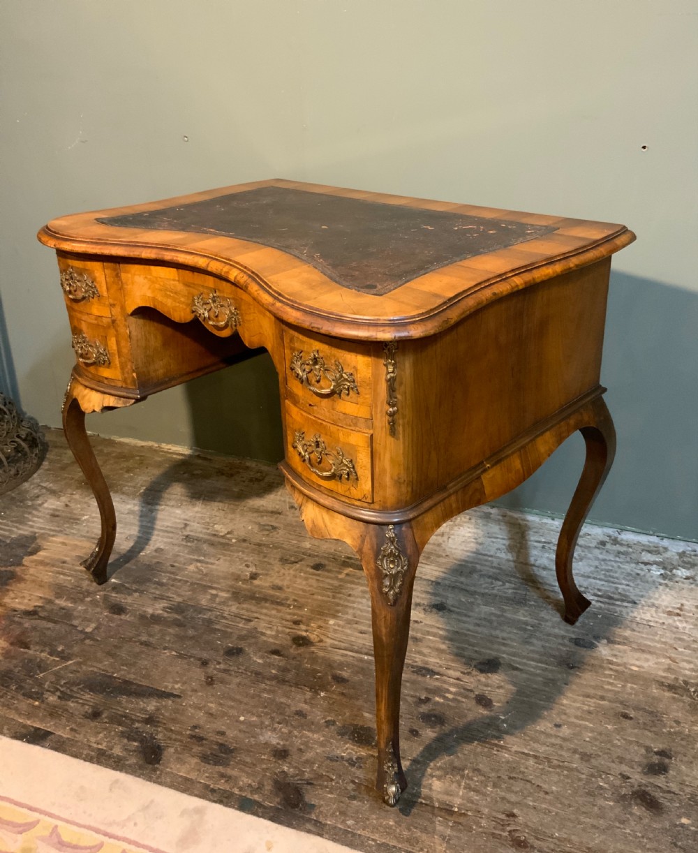 A walnut writing table