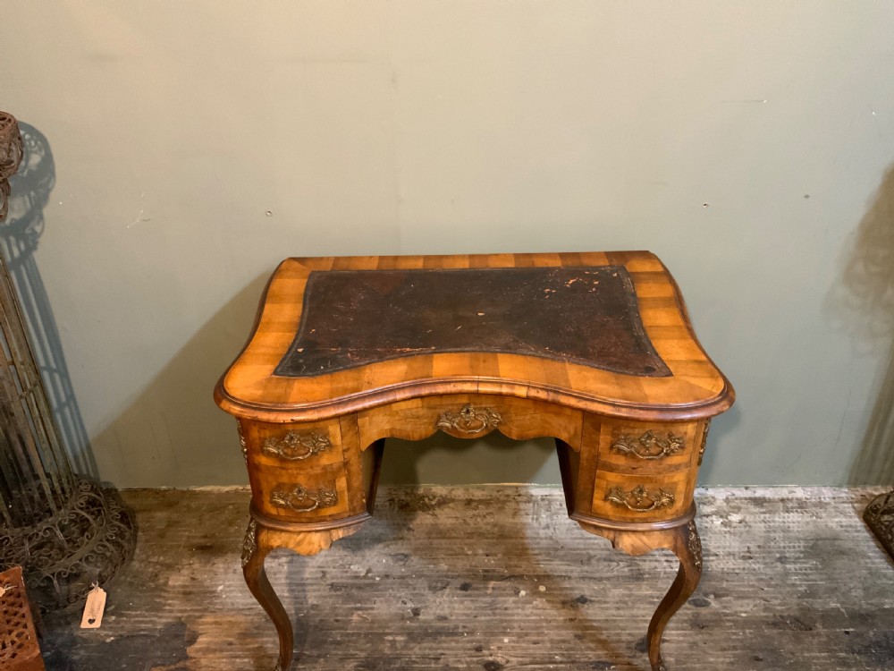 A walnut writing table View III