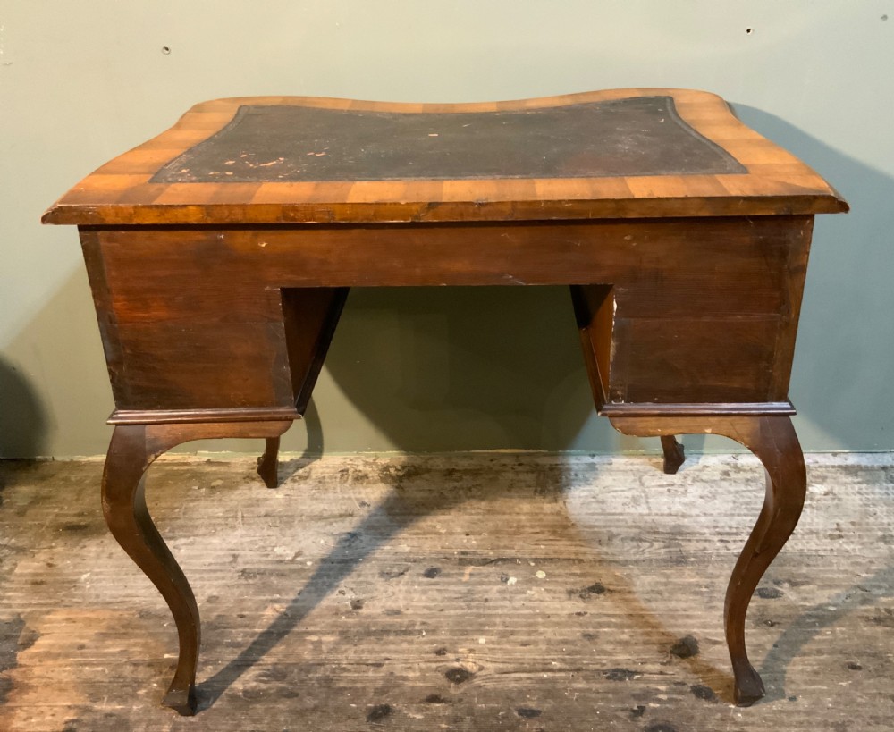 A walnut writing table View V