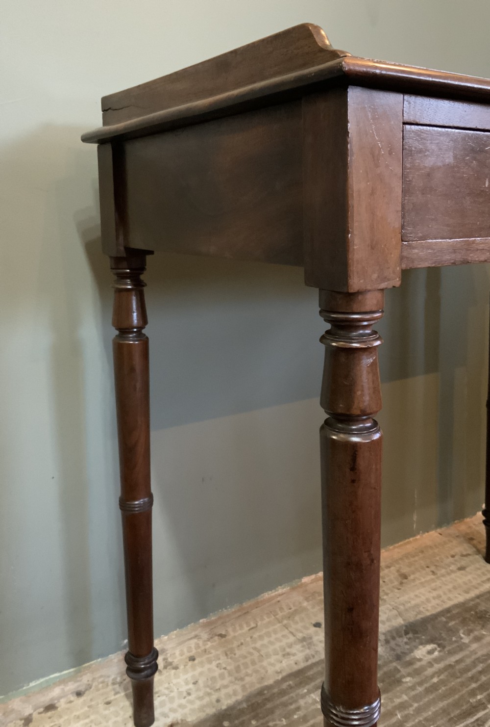 A two drawer mahogany table View V