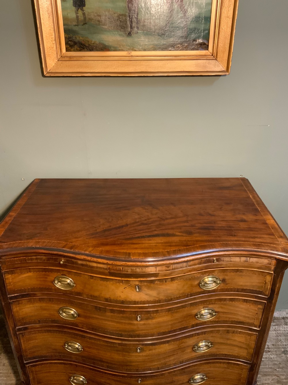 An 18th century mahogany serpentine chest View II