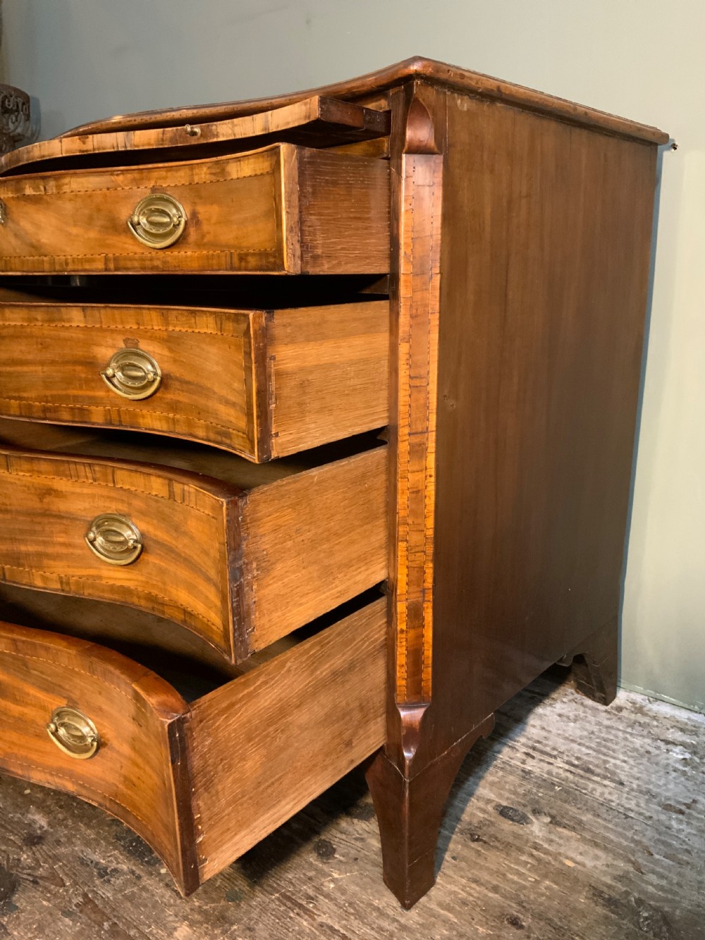 An 18th century mahogany serpentine chest View IV