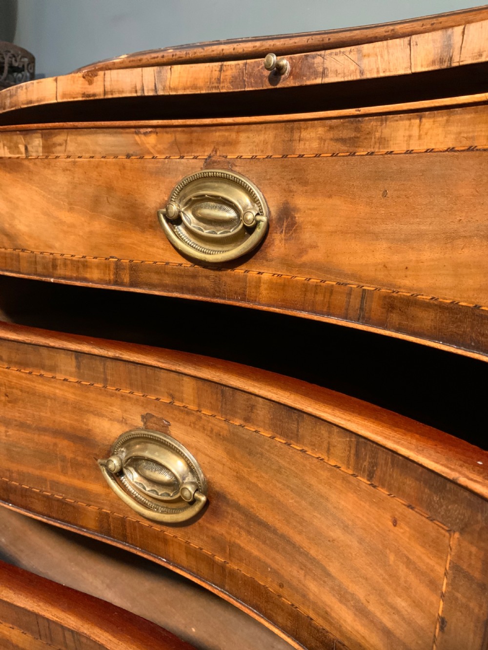An 18th century mahogany serpentine chest View VI