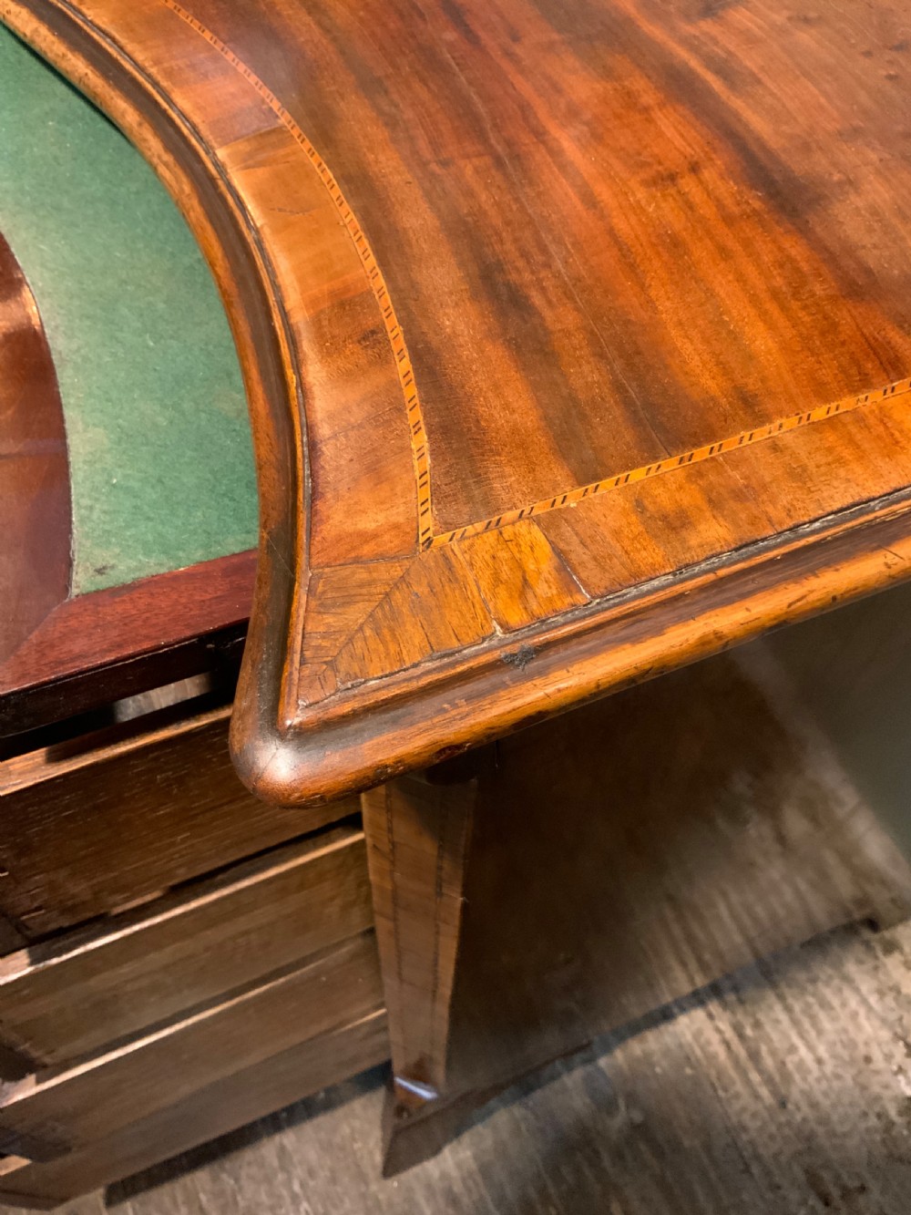 An 18th century mahogany serpentine chest View VII