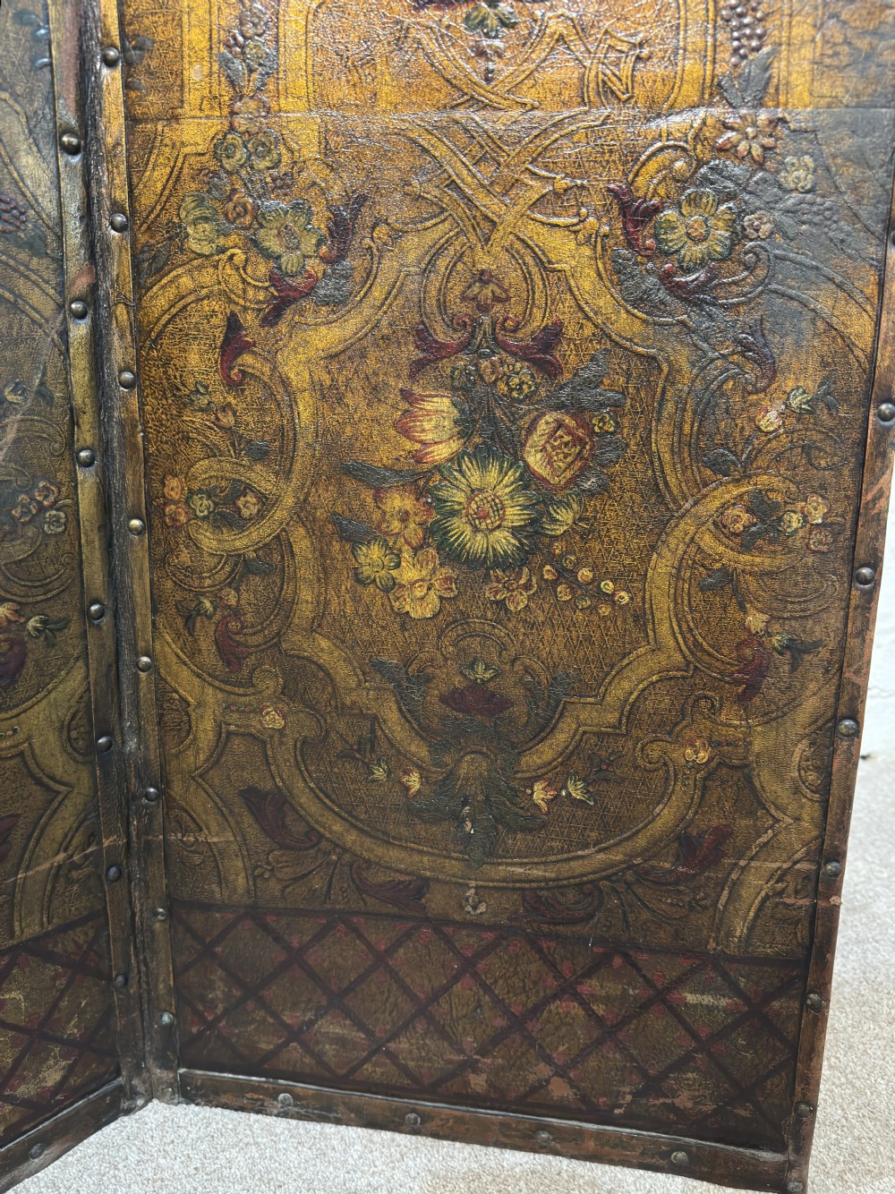 An embossed painted leather screen View IV