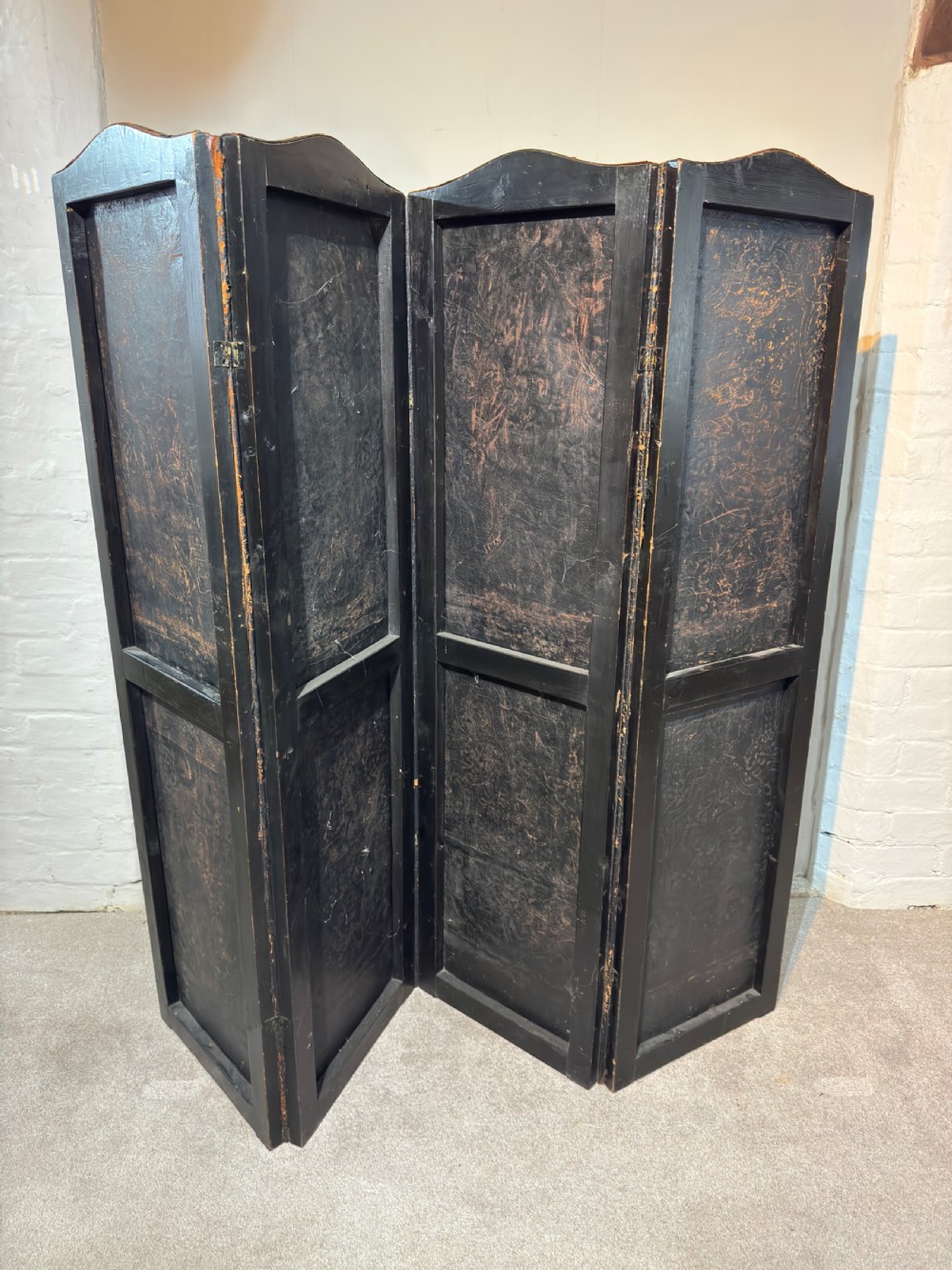 An embossed painted leather screen View VII