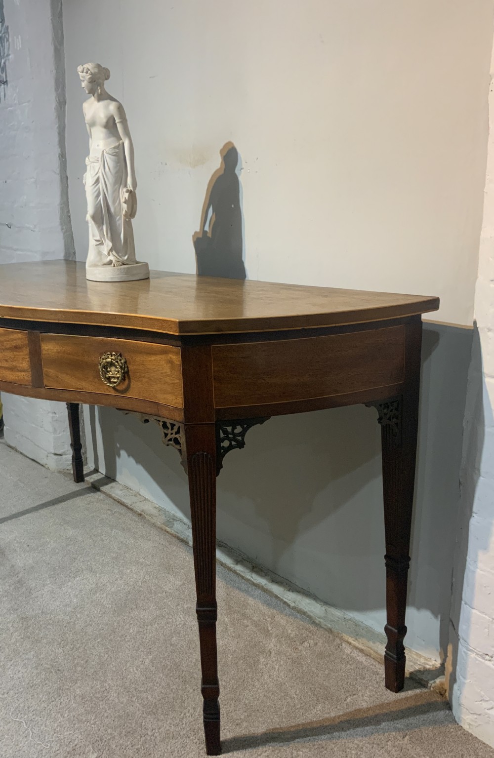 A 19th century mahogany side table View XI