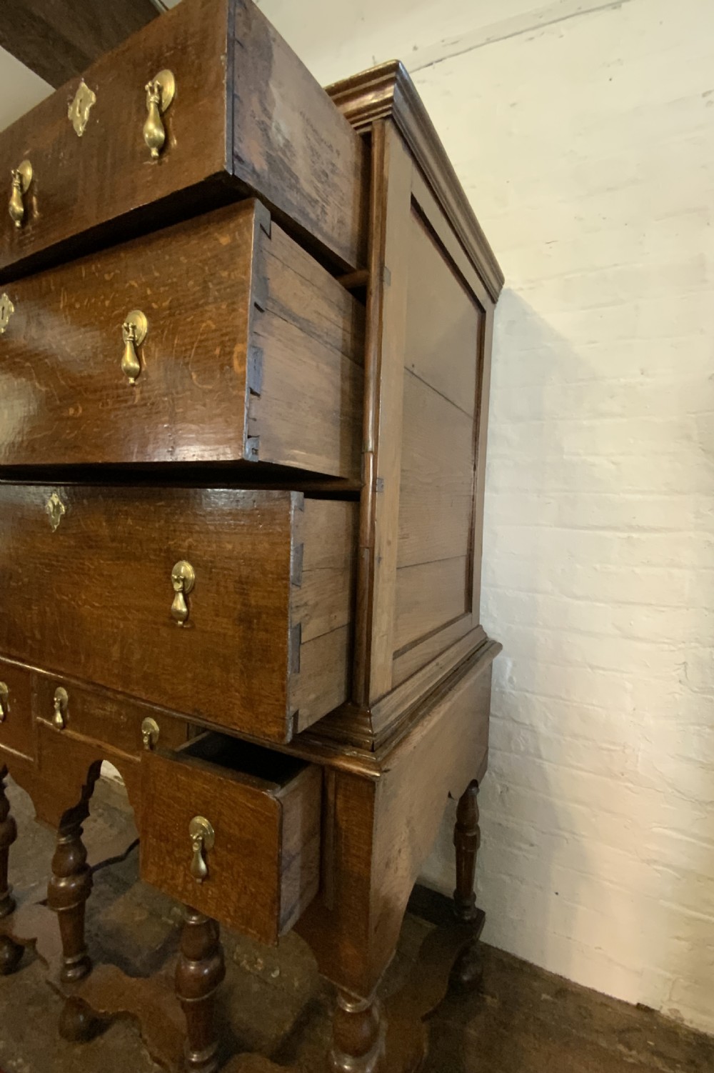 A Queen Anne period oak chest on stand View VI