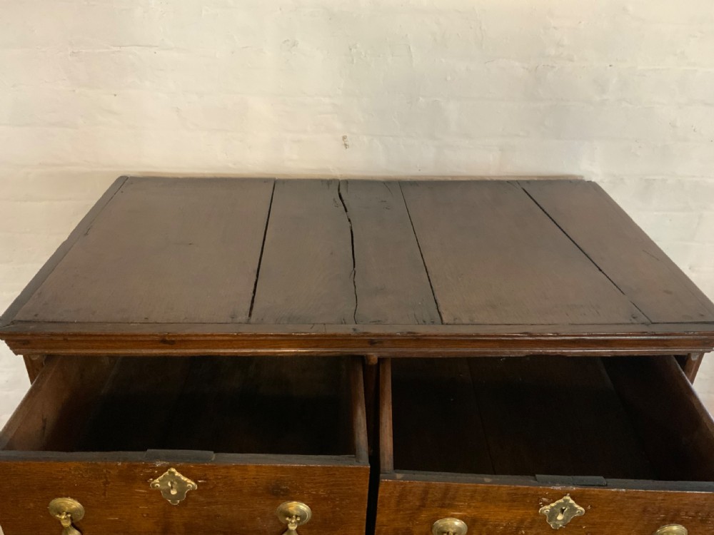 A Queen Anne period oak chest on stand View VII